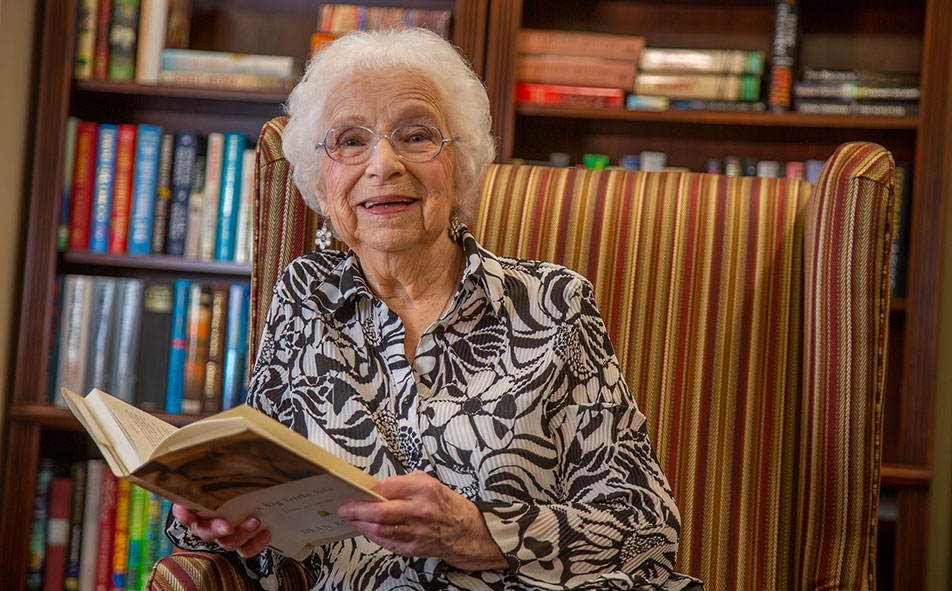 Independent Silver Spring area senior reading a book
