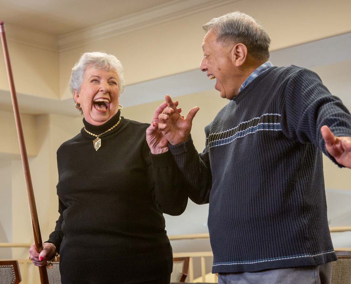 Wilshire Estates seniors playing billiards