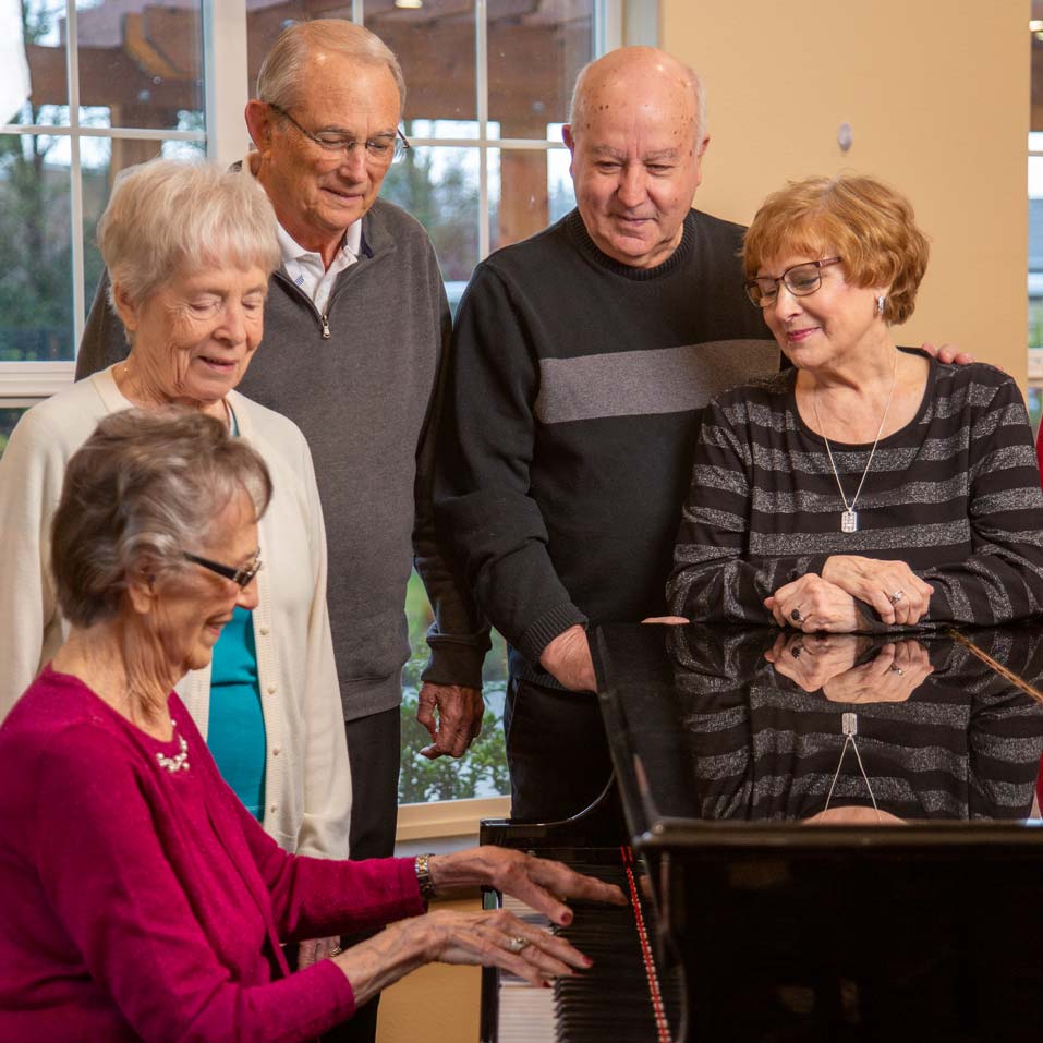 Silver Spring seniors playing piano