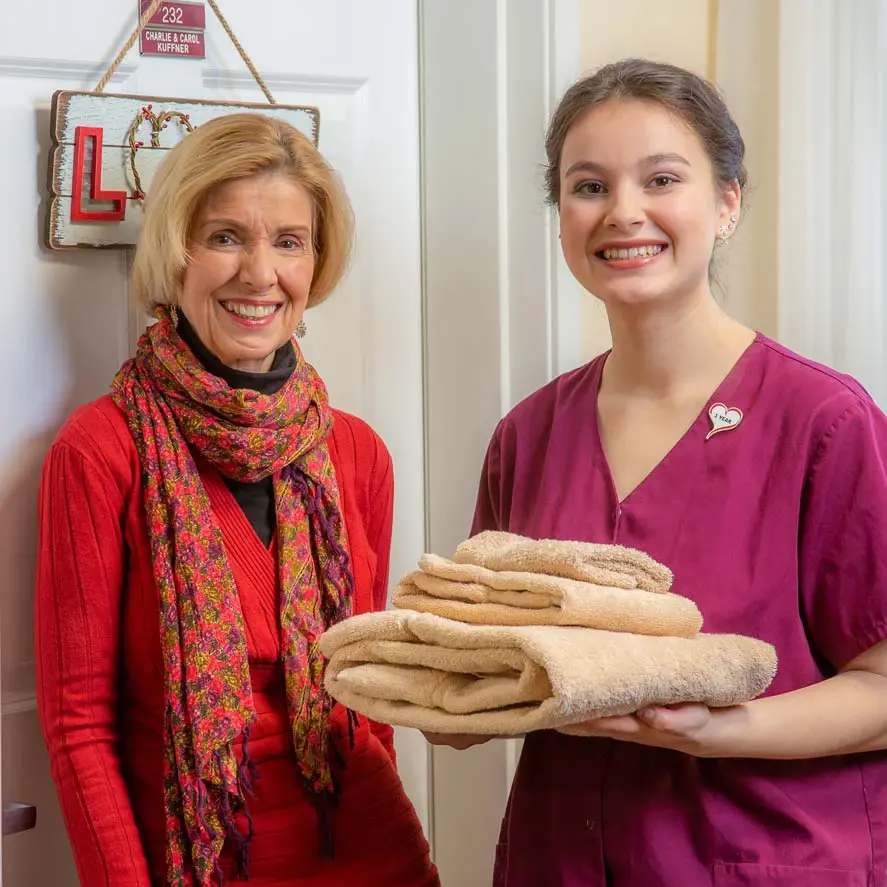 Wilshire Estates women given towels to women